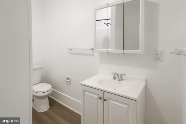 a bathroom with a sink and a toilet