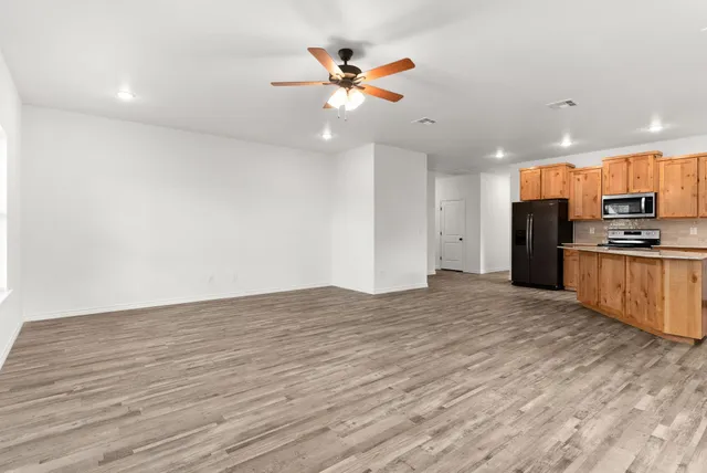 a view of a kitchen with a stove