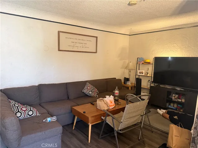 a kitchen with sink and cabinets