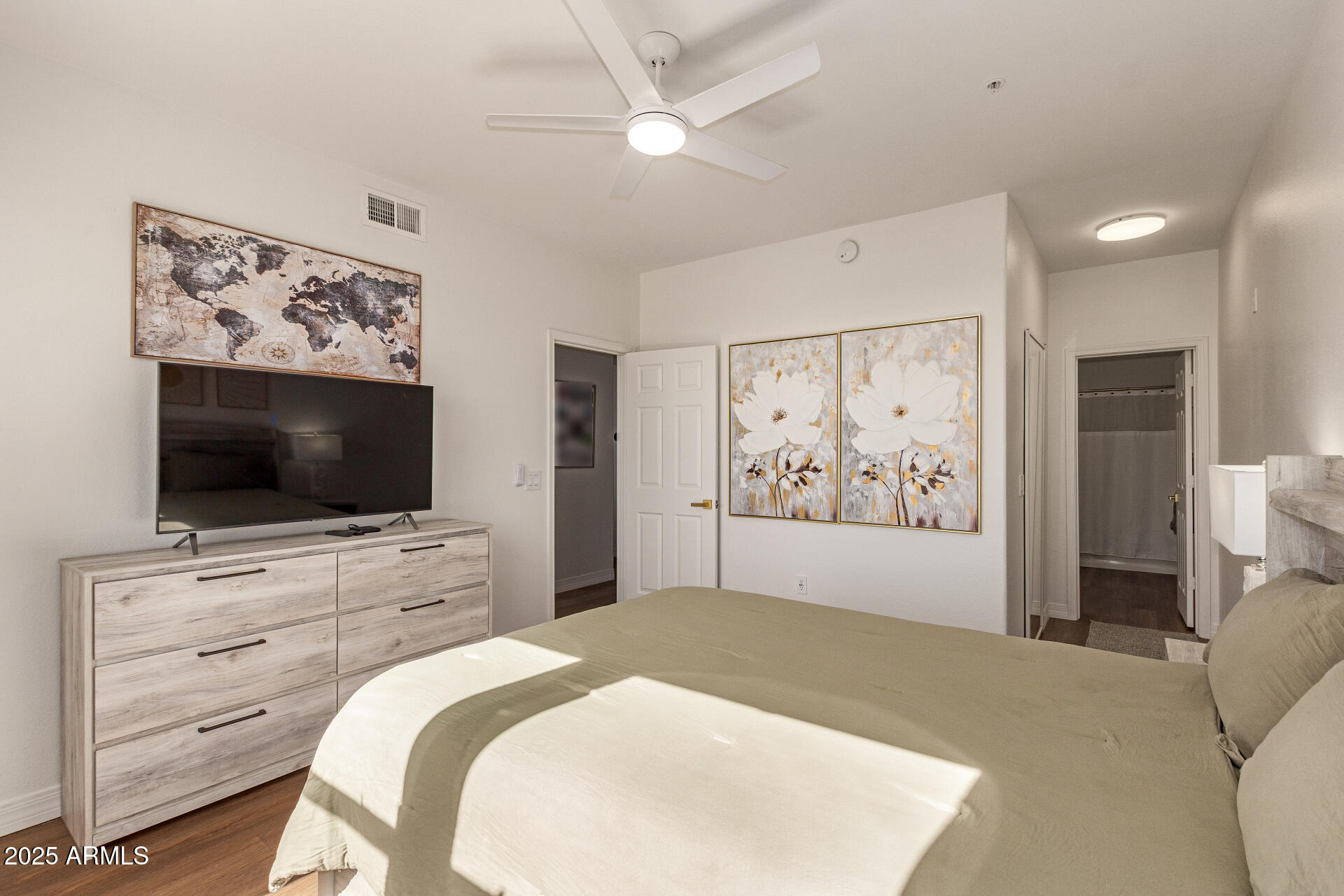 20100 North 78th Place, Unit 2083 Scottsdale, AZ 85255 - Photo 12 of 40 a bedroom with a bed and a flat screen tv