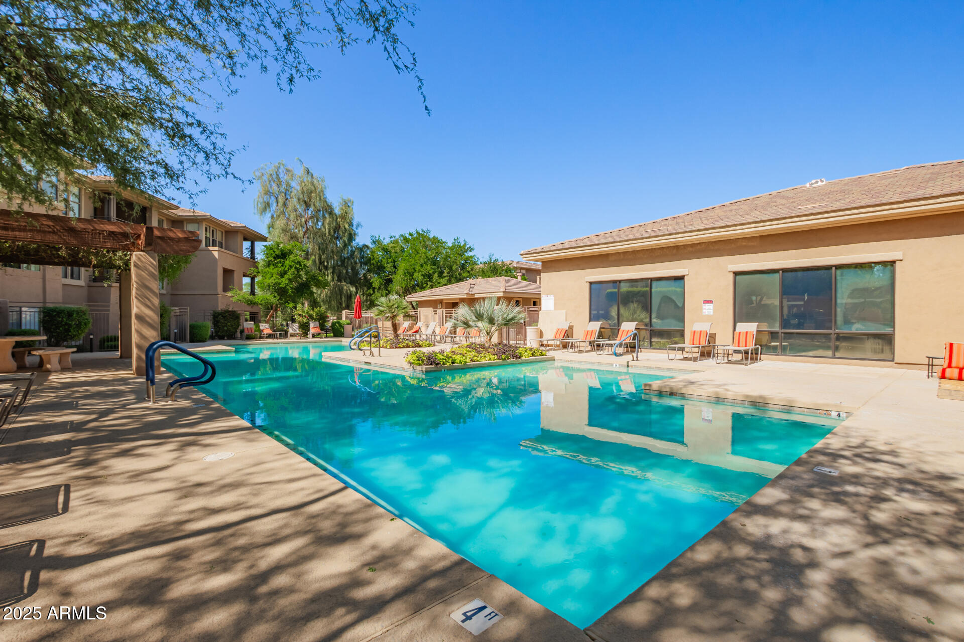 20100 North 78th Place, Unit 2083 Scottsdale, AZ 85255 - Photo 35 of 40 a view of house with swimming pool outdoor seating