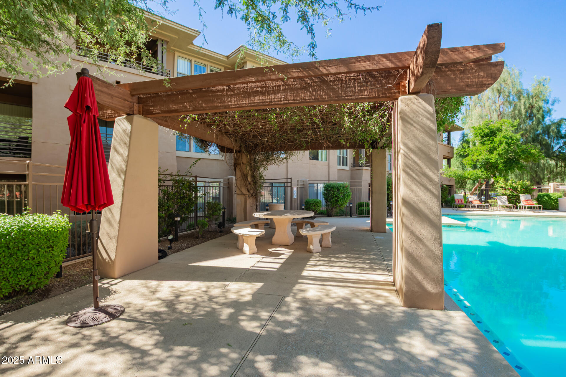 20100 North 78th Place, Unit 2083 Scottsdale, AZ 85255 - Photo 36 of 40 a view of a house with backyard and sitting area