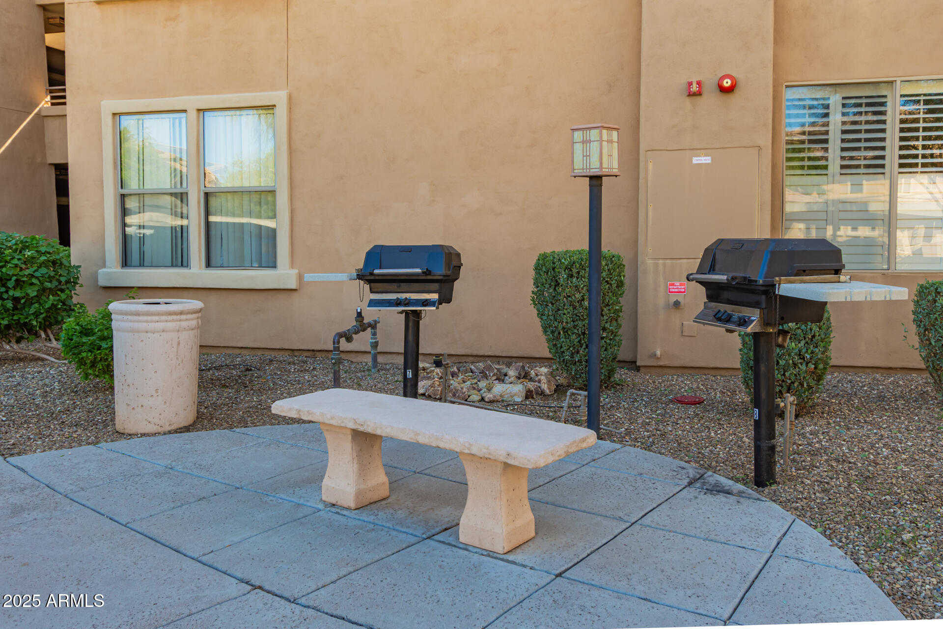 20100 North 78th Place, Unit 2083 Scottsdale, AZ 85255 - Photo 39 of 40 a table and chairs in the patio