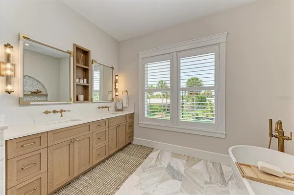 a bed room with a bed and a window