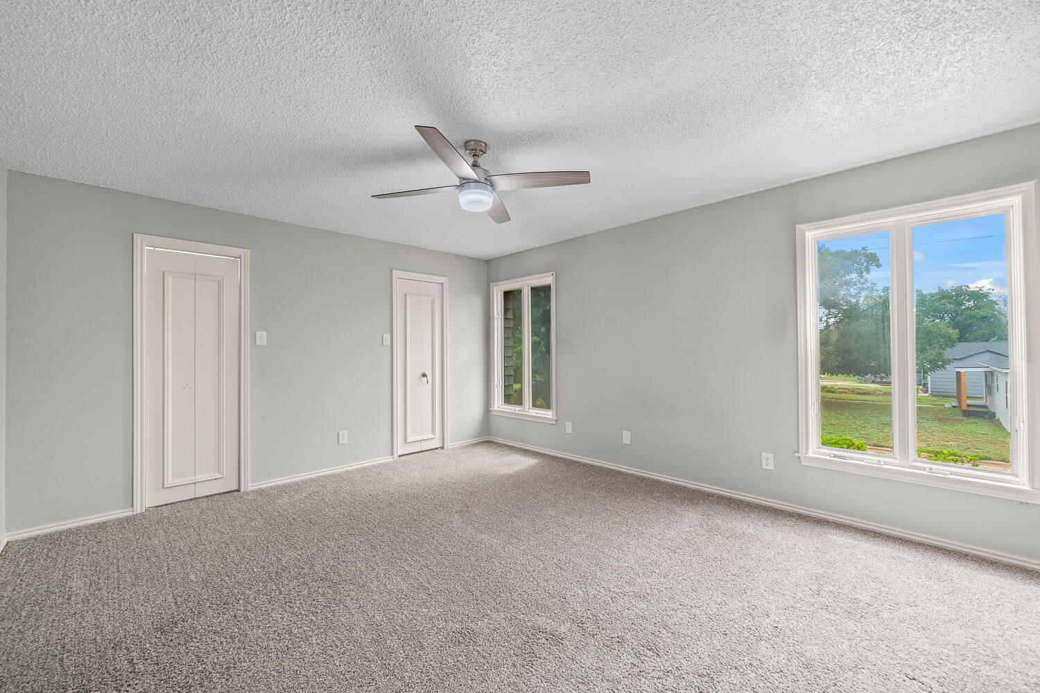 2302 Slide Road, Unit 35 Lubbock, TX 79407 - Photo 16 of 43 a view of an empty room with a window