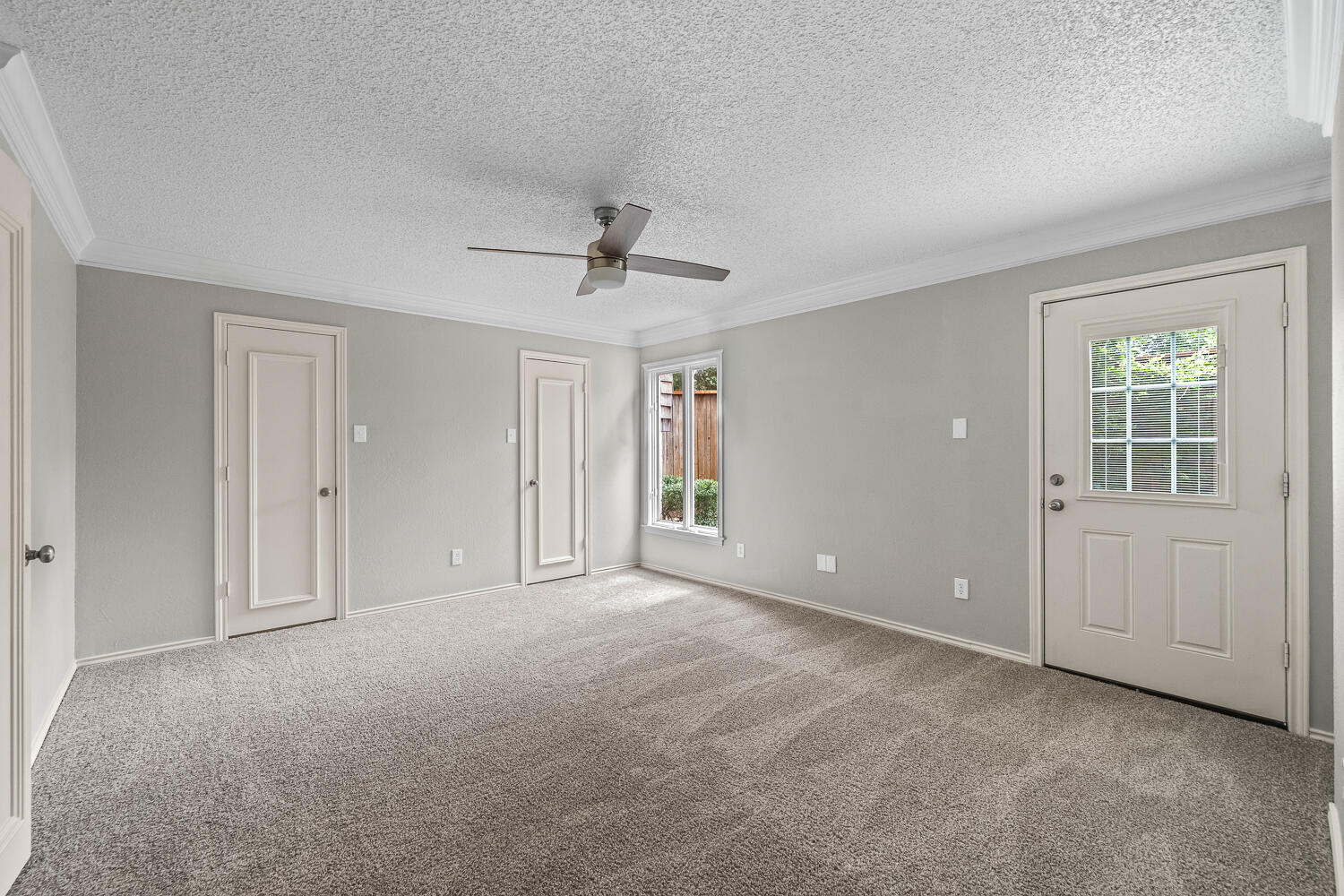 2302 Slide Road, Unit 35 Lubbock, TX 79407 - Photo 18 of 43 a view of an empty room with a window