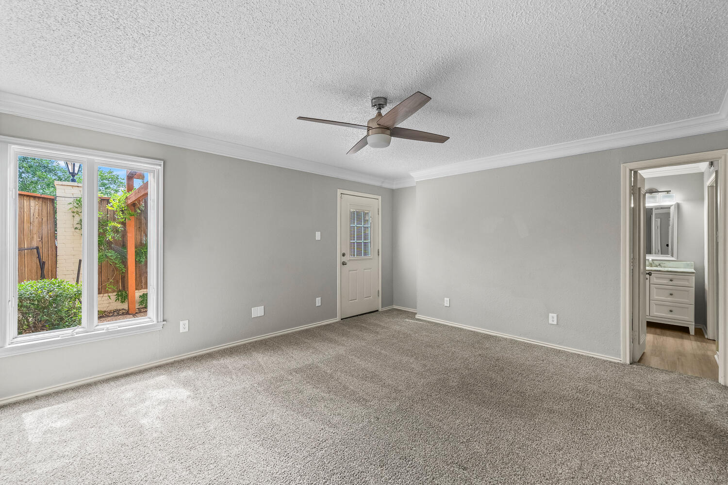 2302 Slide Road, Unit 35 Lubbock, TX 79407 - Photo 27 of 43 a view of an empty room with a window