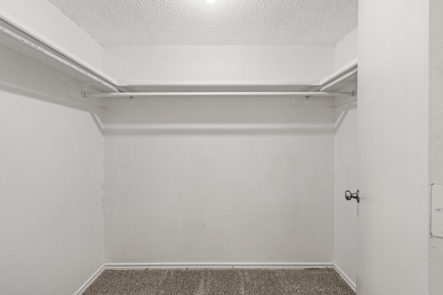2302 Slide Road, Unit 35 Lubbock, TX 79407 - Photo 28 of 43 a view of an empty walk in closet