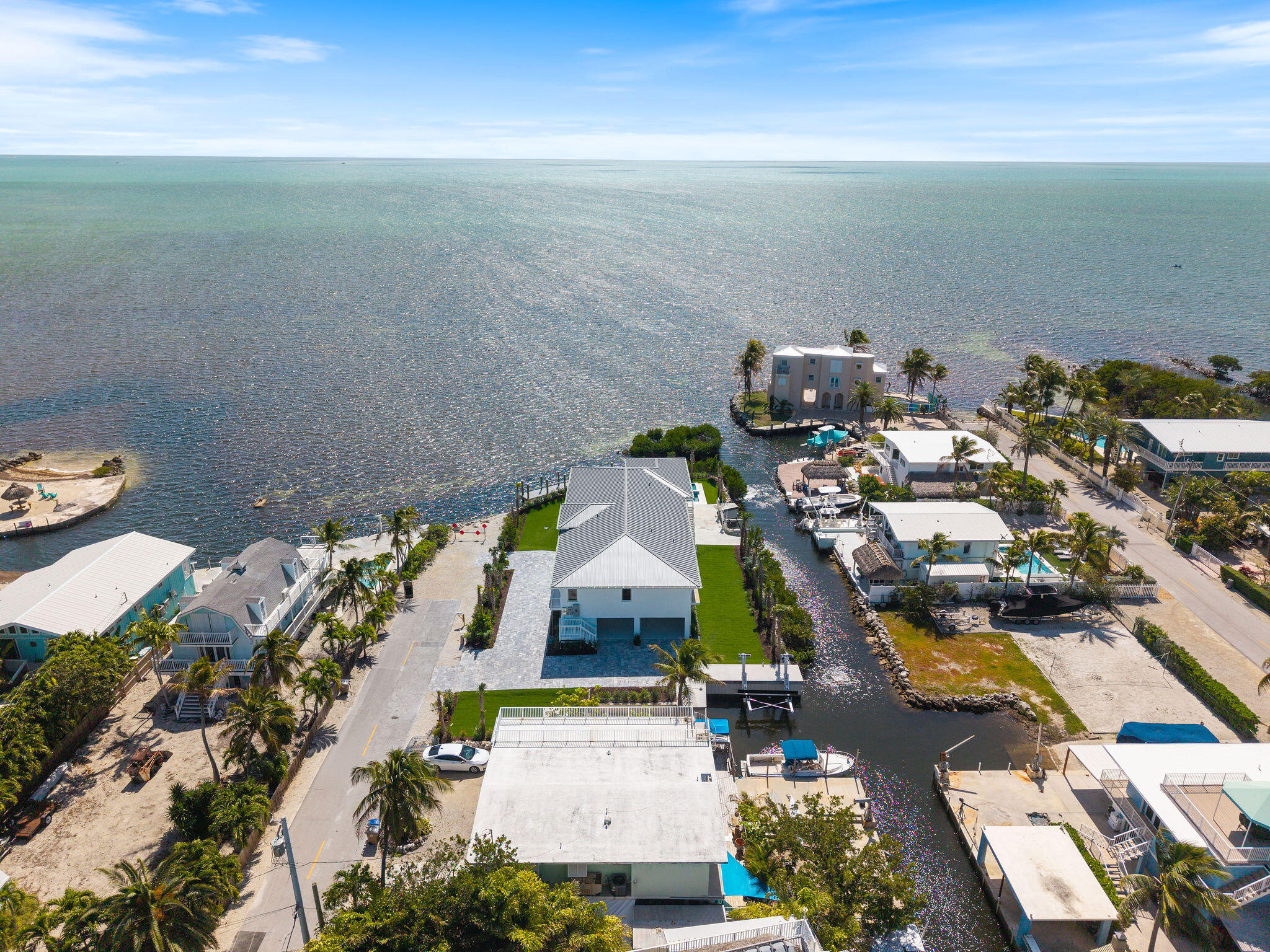 1002 Snapper Lane Key Largo, FL 33037 - Photo 102 of 106 an aerial view of residential houses with outdoor space