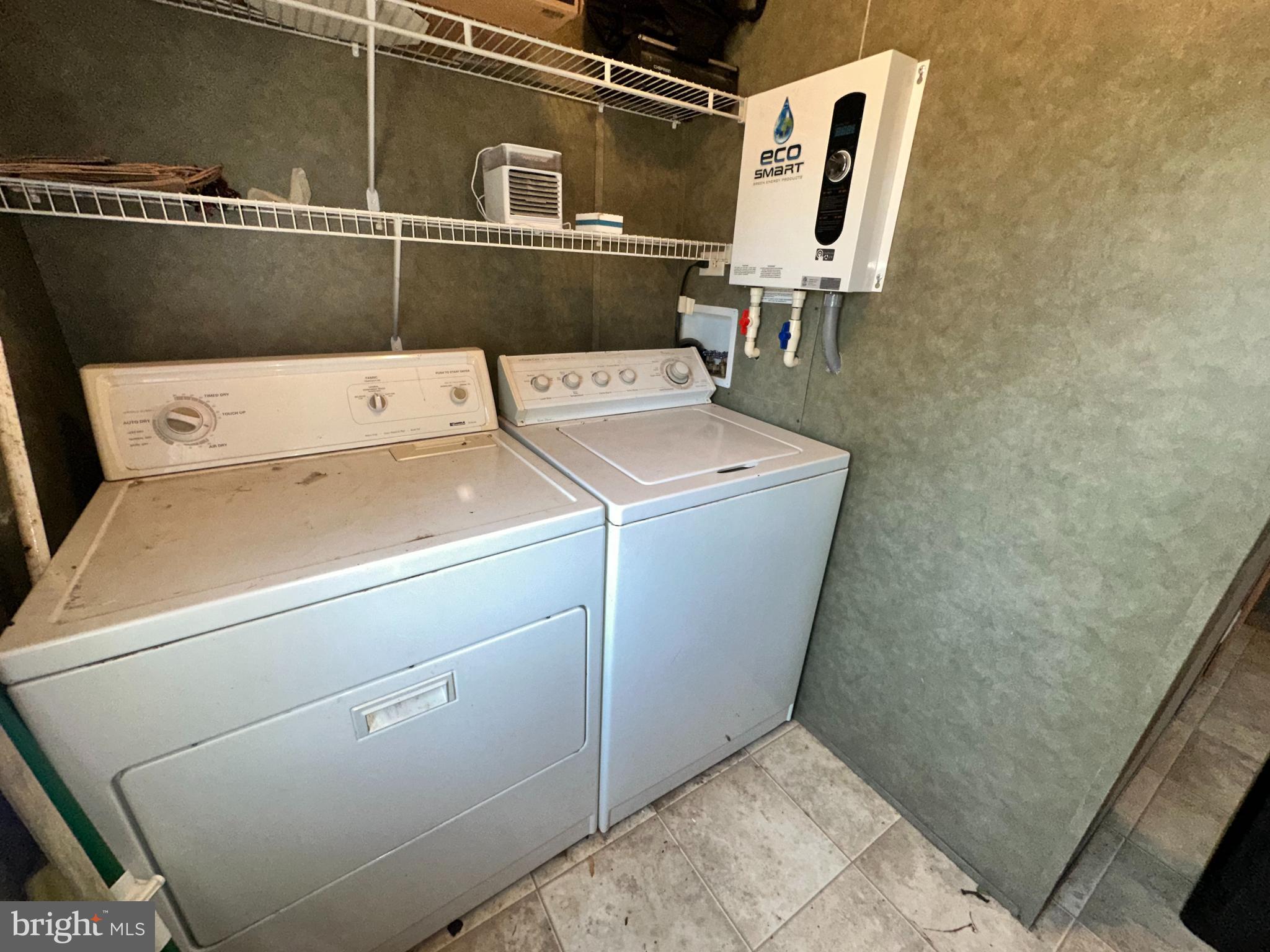 35390 Heron Road Millsboro, DE 19966 - Photo 18 of 25 a utility room with dryer and washer