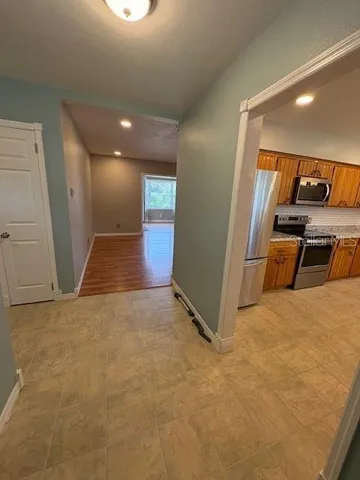 a view of a livingroom with a staircase