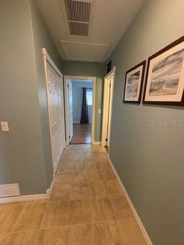 a view of livingroom with hallway