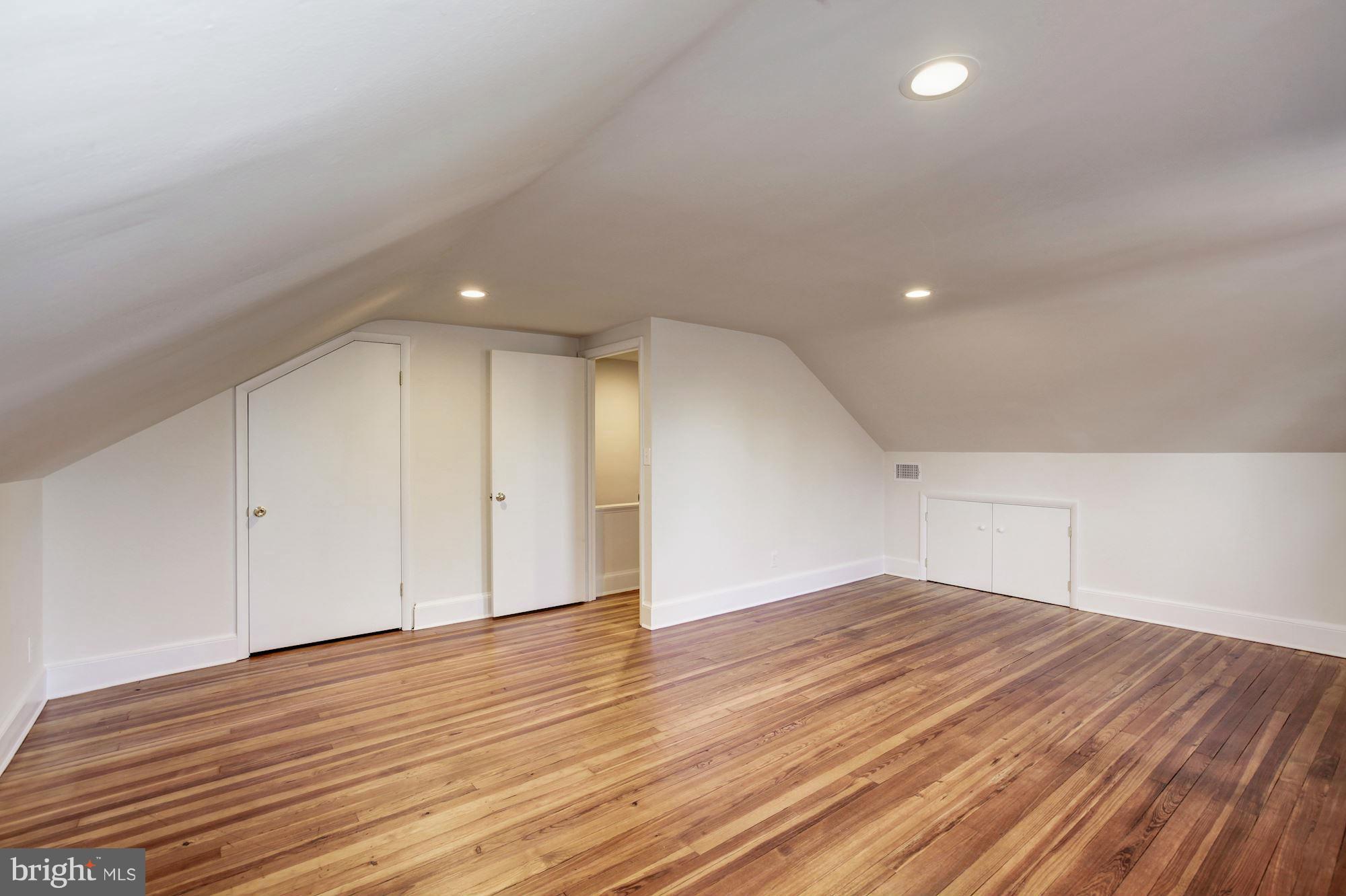 3111 Rittenhouse Street Northwest Washington, DC 20015 - Photo 21 of 30 a view of empty room with wooden floor