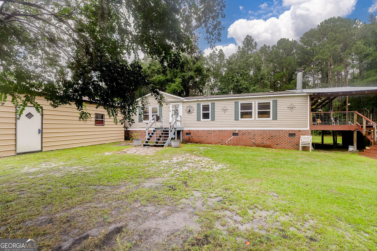 150 Reed Street Bloomingdale, GA 31302 - Photo 2 of 32 Front view