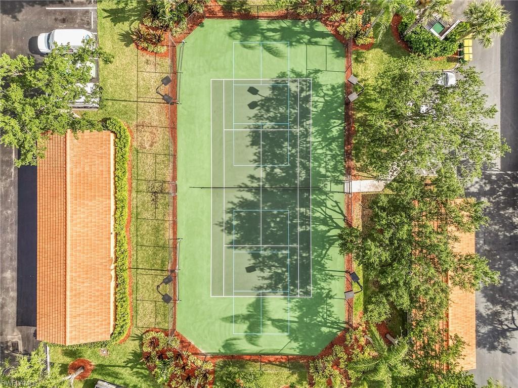 1180 Wildwood Lakes Boulevard, Unit 208 Naples, FL 34104 - Photo 18 of 19 a bathroom with a shower