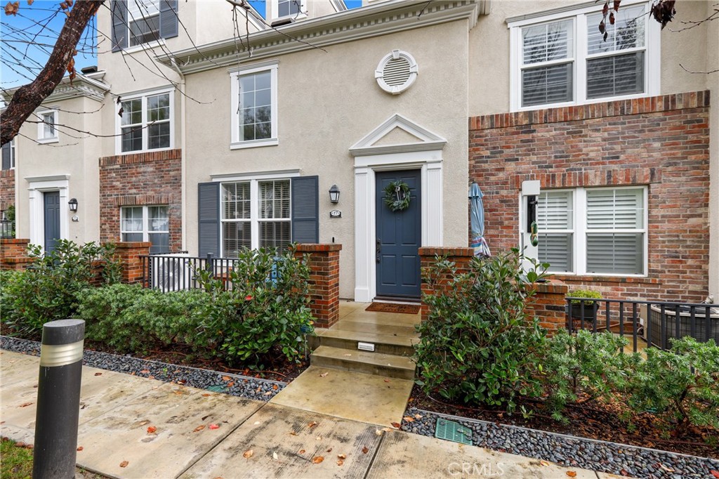 17 Granville Street, Unit 57 Ladera Ranch, CA 92694 - Photo 1 of 1 a front view of a house with garden