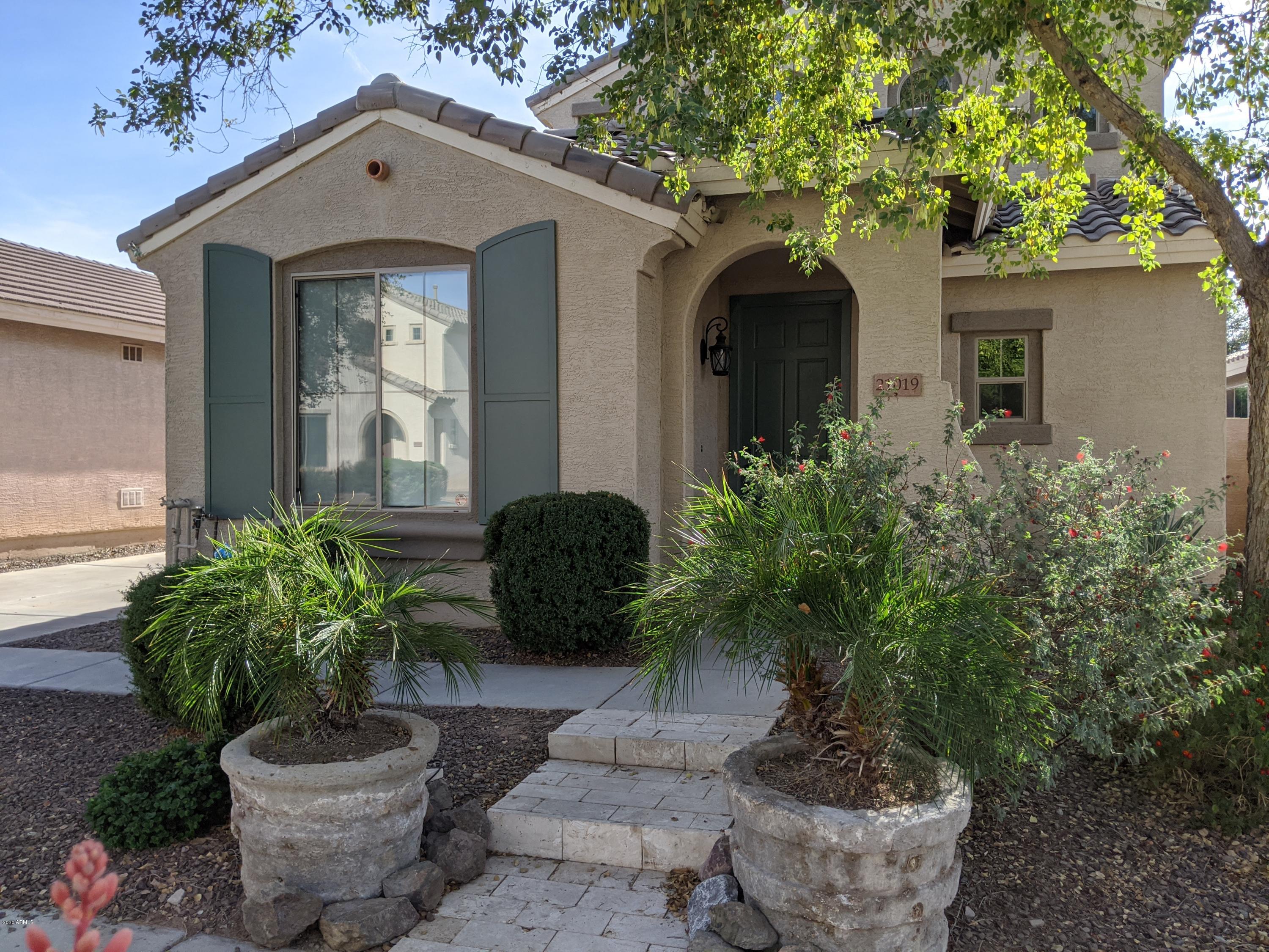 21019 East Avenida Del Valle Queen Creek, AZ 85142 - Photo 1 of 52 a view of a house with a potted plant and a potted plant