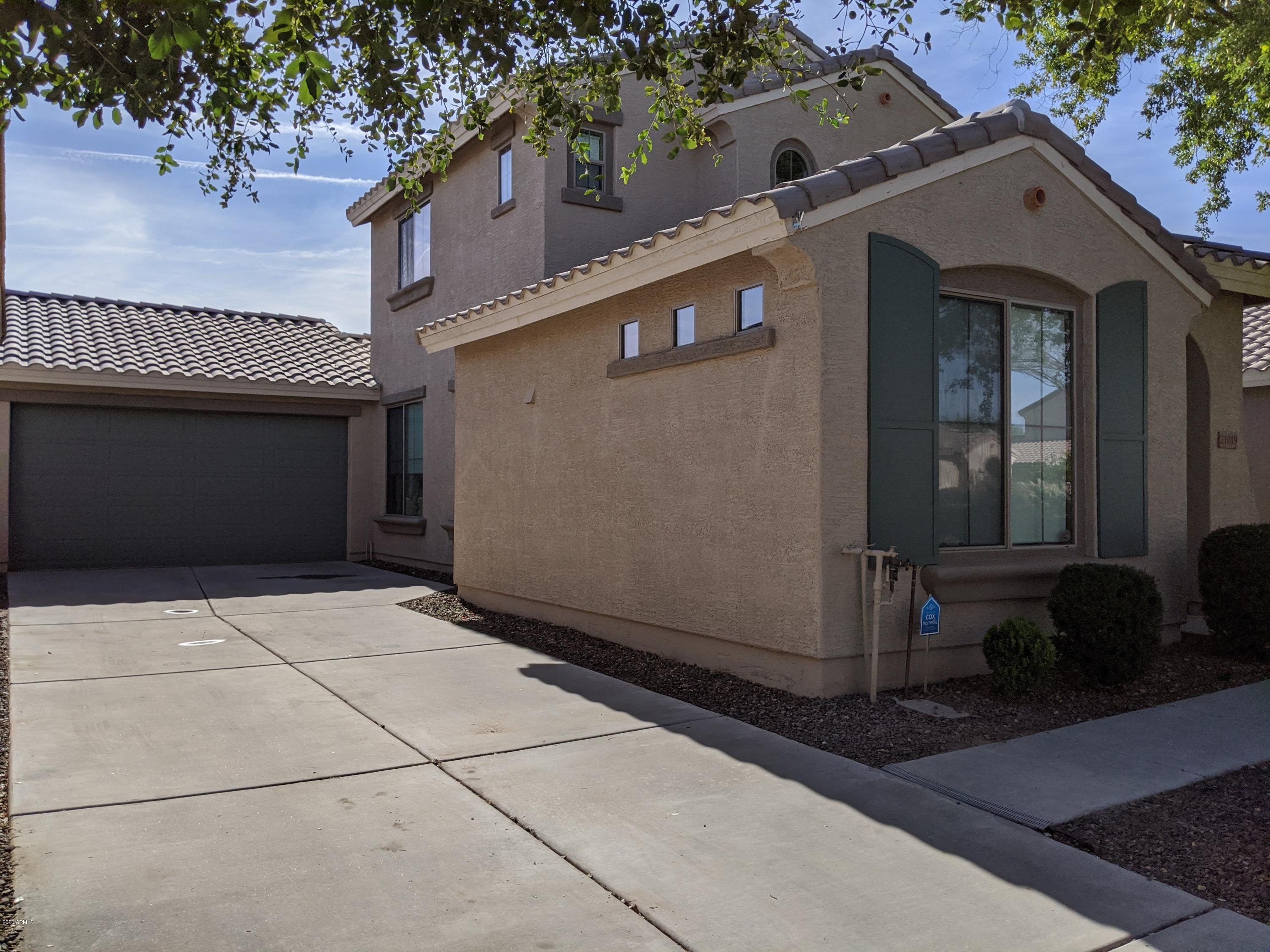 21019 East Avenida Del Valle Queen Creek, AZ 85142 - Photo 3 of 52 a view of a house with a door