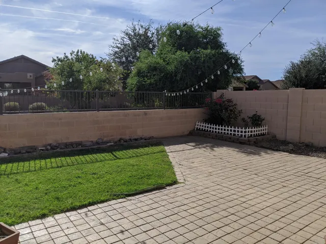 a view of a back yard of the house