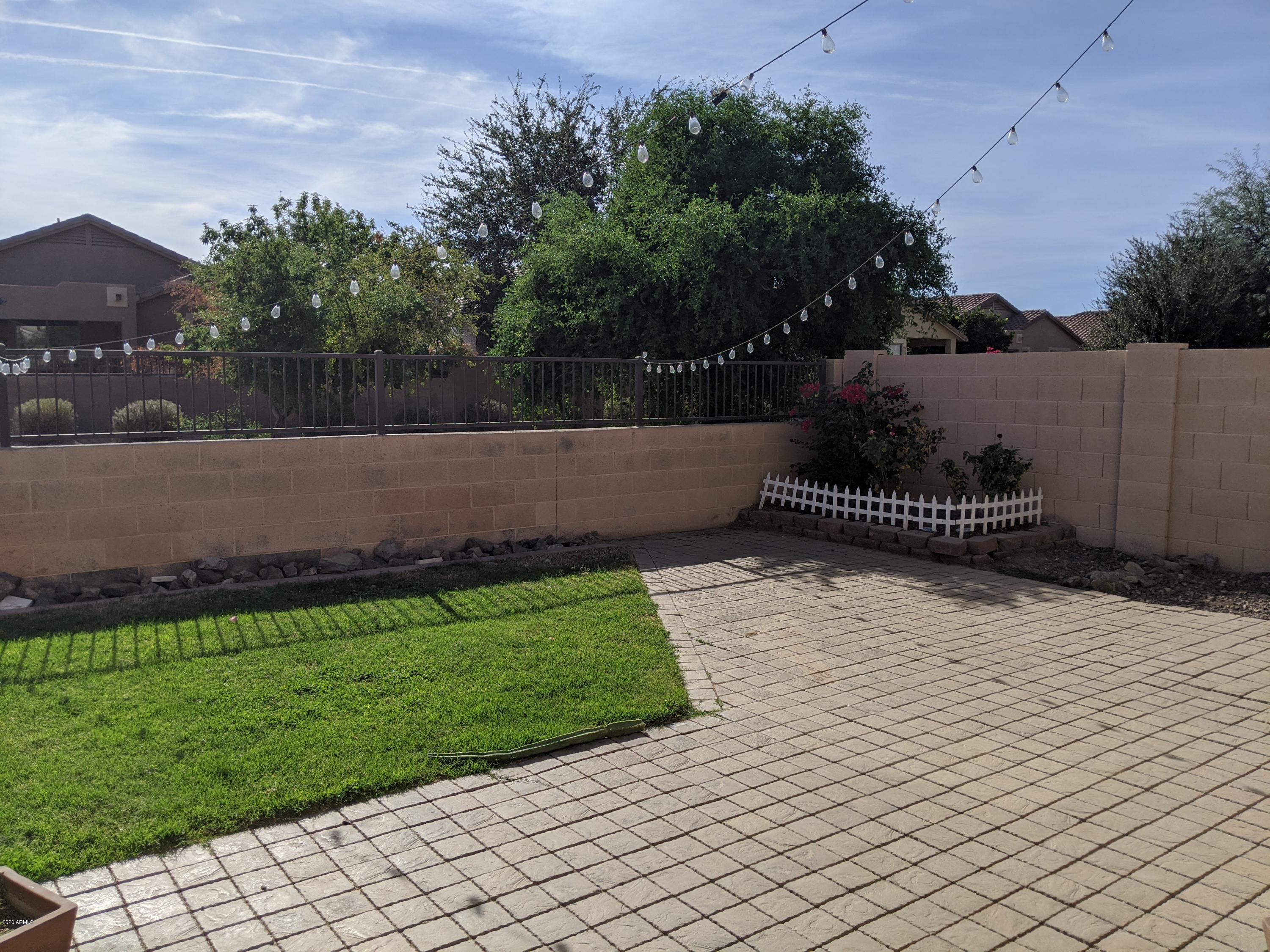 21019 East Avenida Del Valle Queen Creek, AZ 85142 - Photo 40 of 52 a backyard of a house