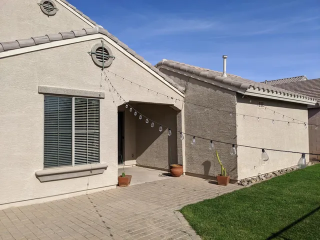 a view of a bench in wooden floor