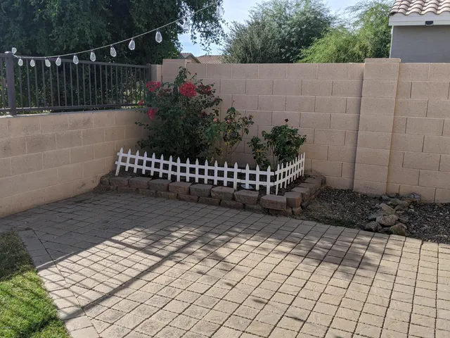 a backyard of a house with seating space