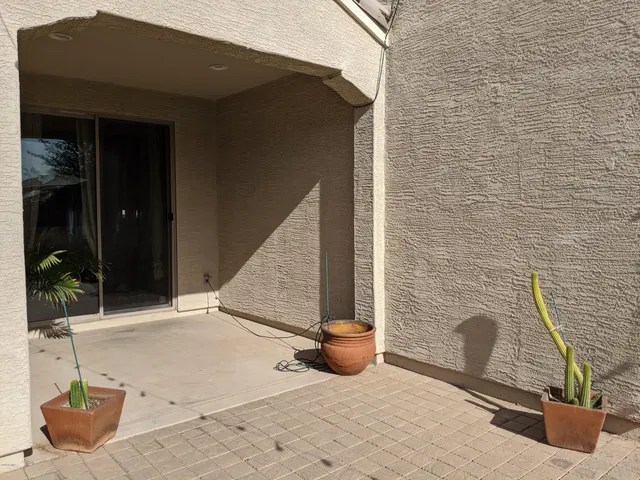 a view of grassy field with benches