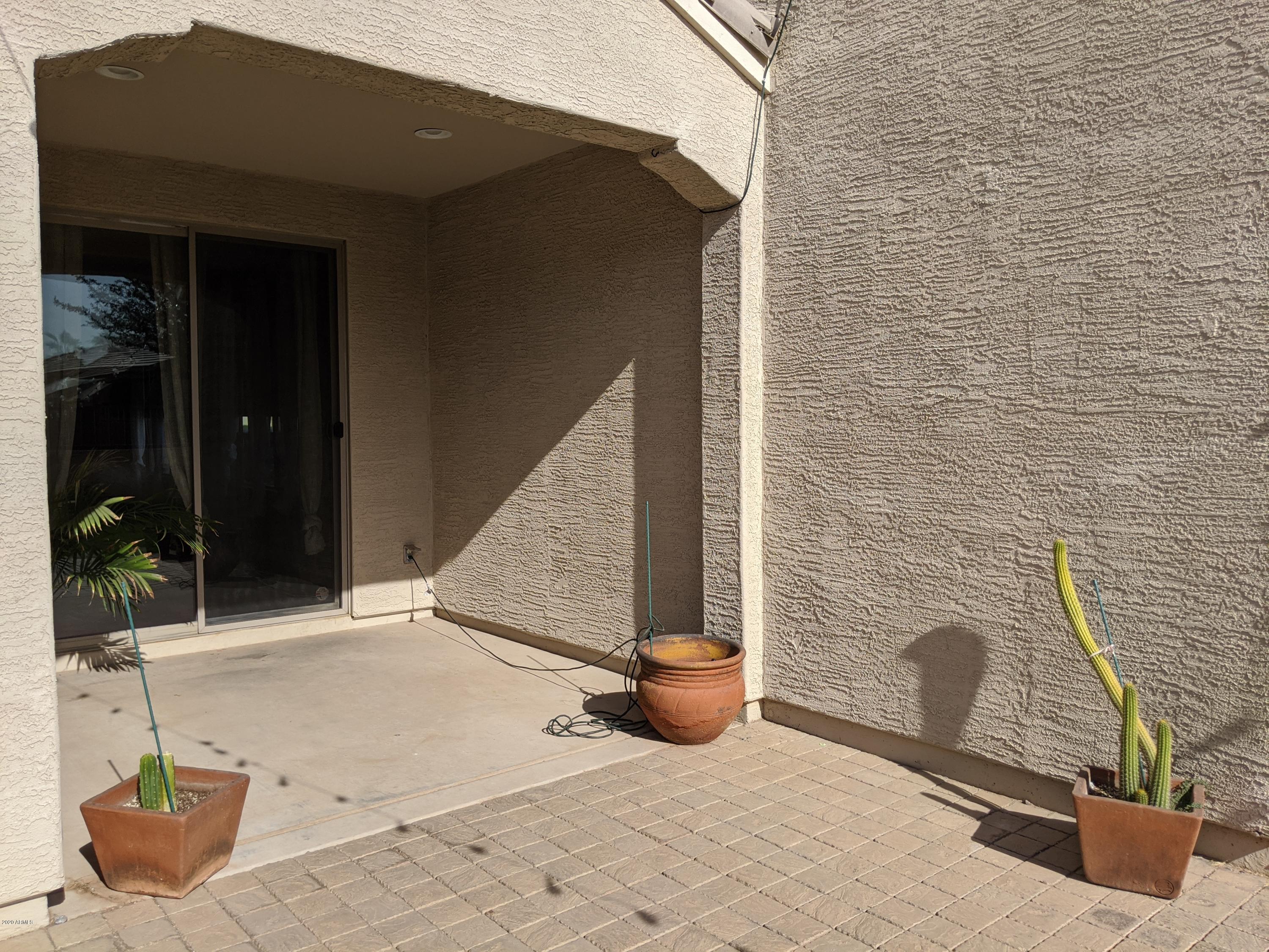 21019 East Avenida Del Valle Queen Creek, AZ 85142 - Photo 46 of 52 a backyard of a house with seating space