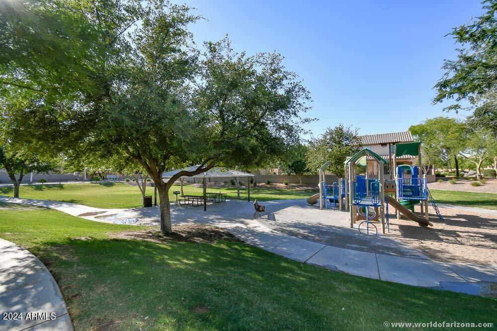 21019 East Avenida Del Valle Queen Creek, AZ 85142 - Photo 52 of 52 a view of a park with swings and slides