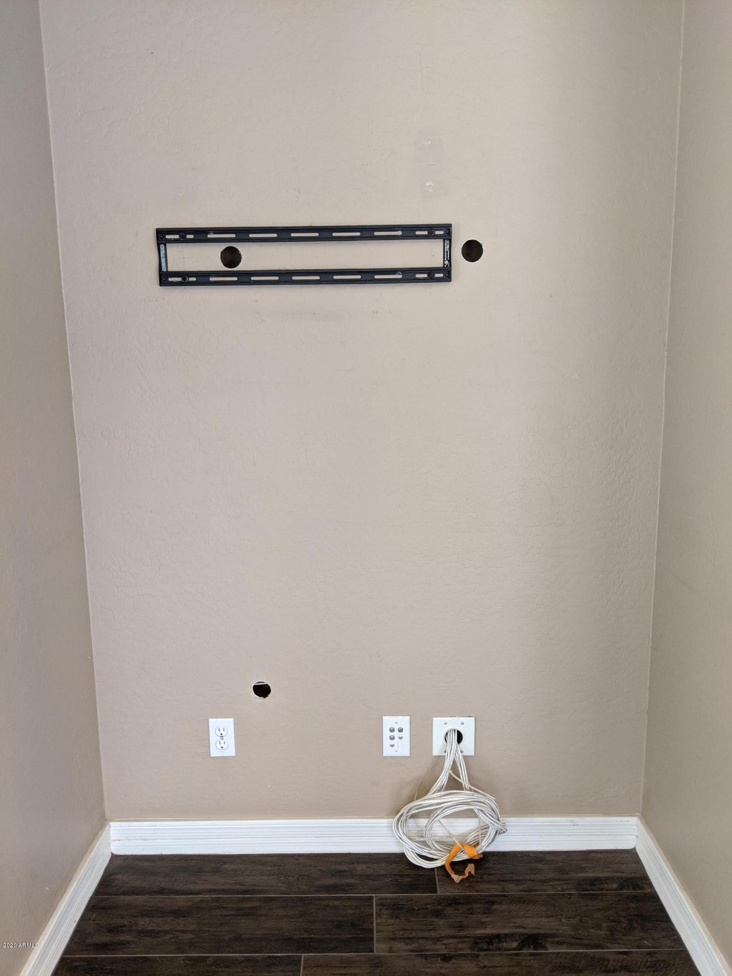 21019 East Avenida Del Valle Queen Creek, AZ 85142 - Photo 9 of 52 a view of room with wooden floor