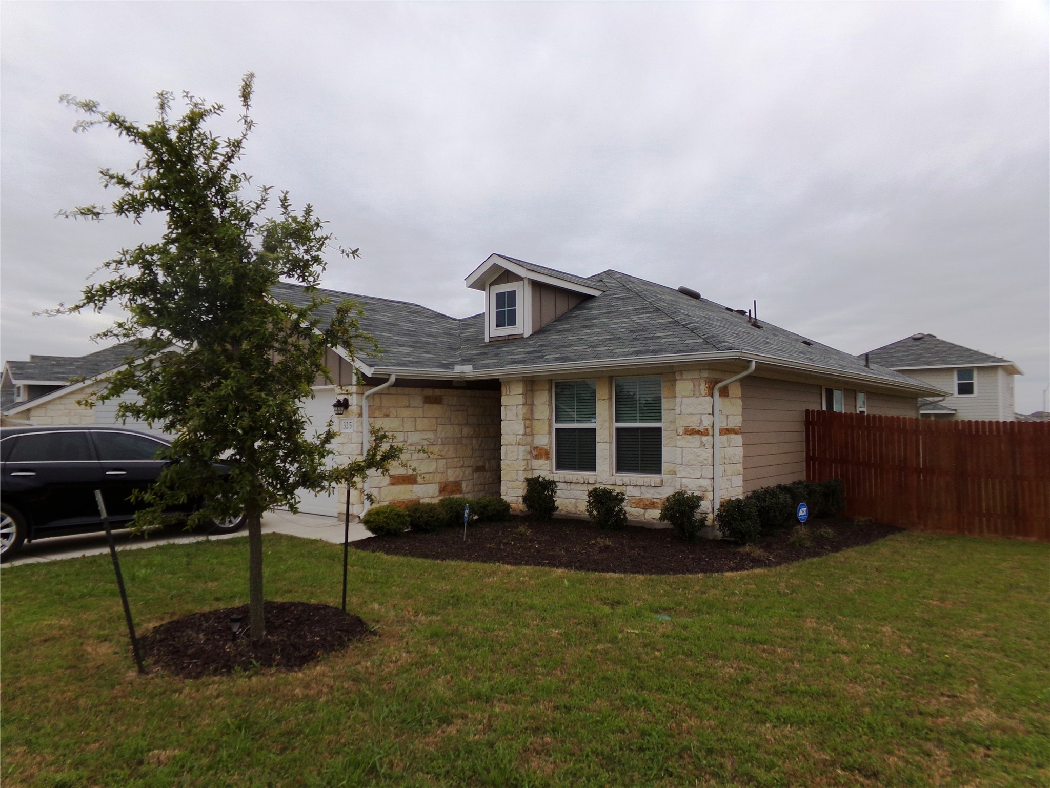 325 Insider Loop Elgin, TX 78621 - Photo 1 of 1 Front of home