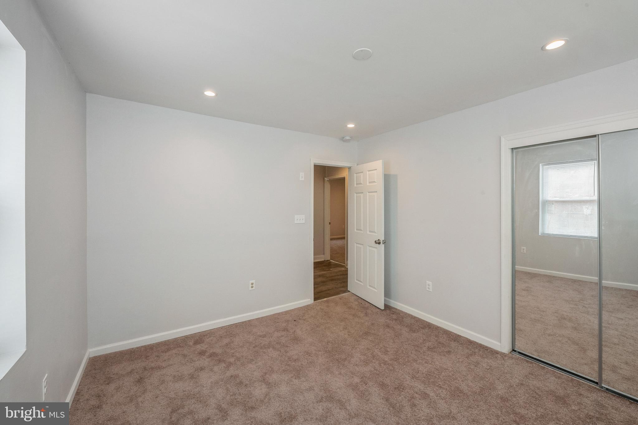 6109 Auth Road Suitland, MD 20746 - Photo 15 of 26 Master Bedroom with Full Bathroom