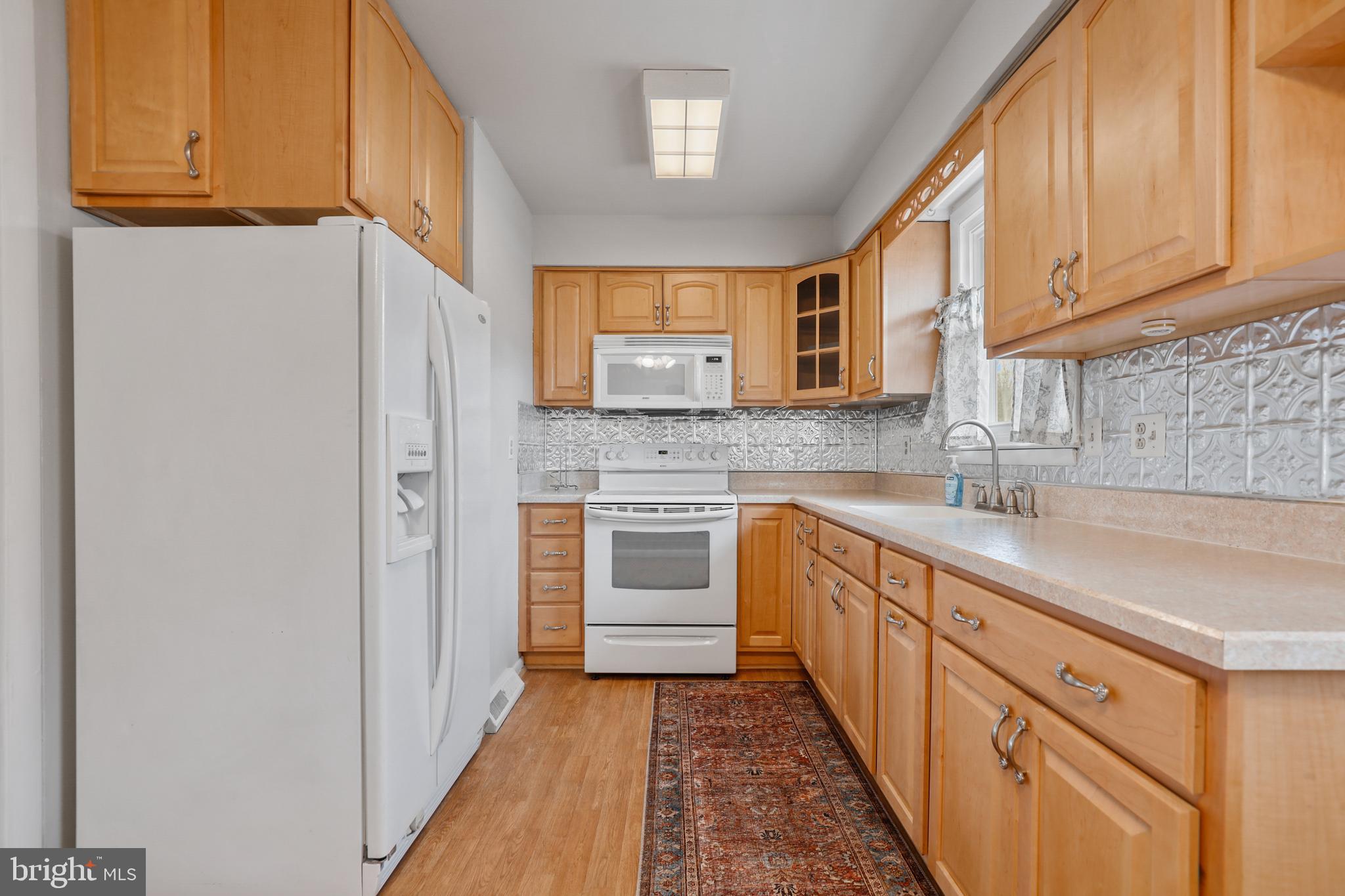1330 Spring Avenue Rosedale, MD 21237 - Photo 6 of 26 Lots of Cabinet space.