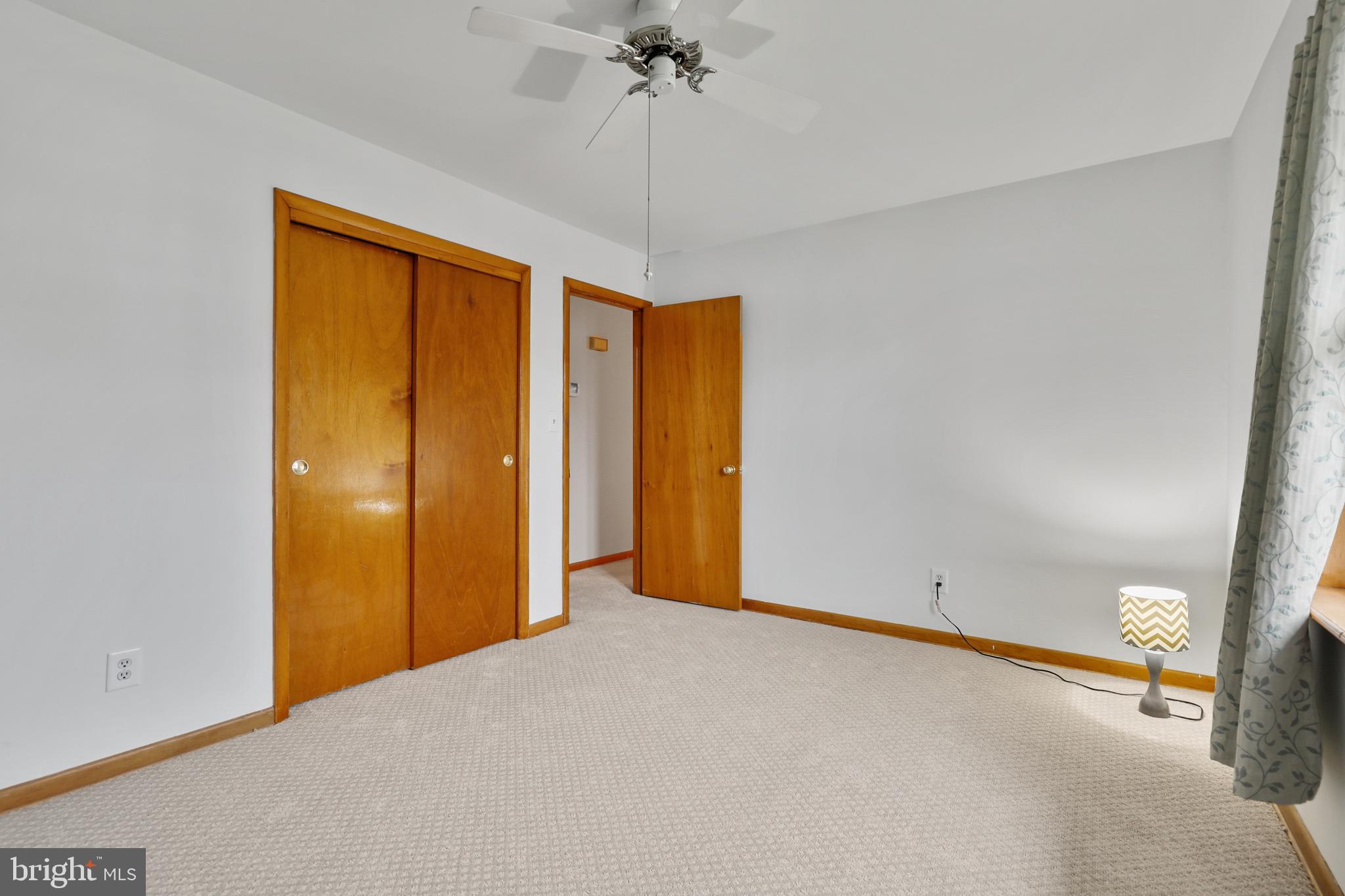 1330 Spring Avenue Rosedale, MD 21237 - Photo 9 of 26 Ceiling Fan and a large closet.
