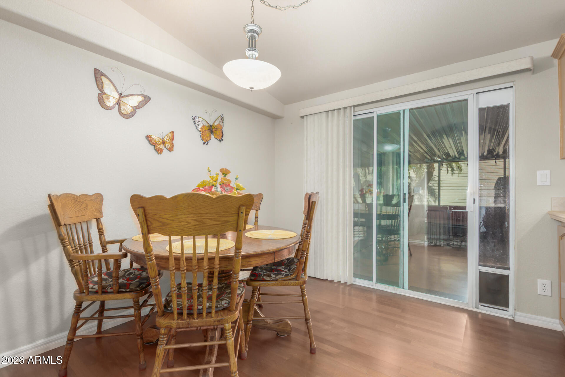 3301 South Goldfield Road, Unit 4086 Apache Junction, AZ 85119 - Photo 6 of 41 a view of a dining room with furniture window and outside view