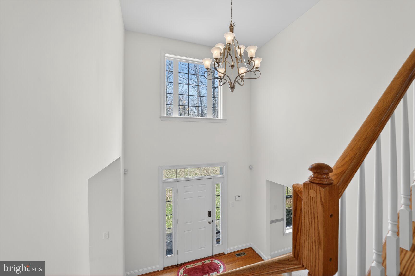 15900 Tanyard Road Upper Marlboro, MD 20772 - Photo 16 of 34 a view of a chandelier in a room