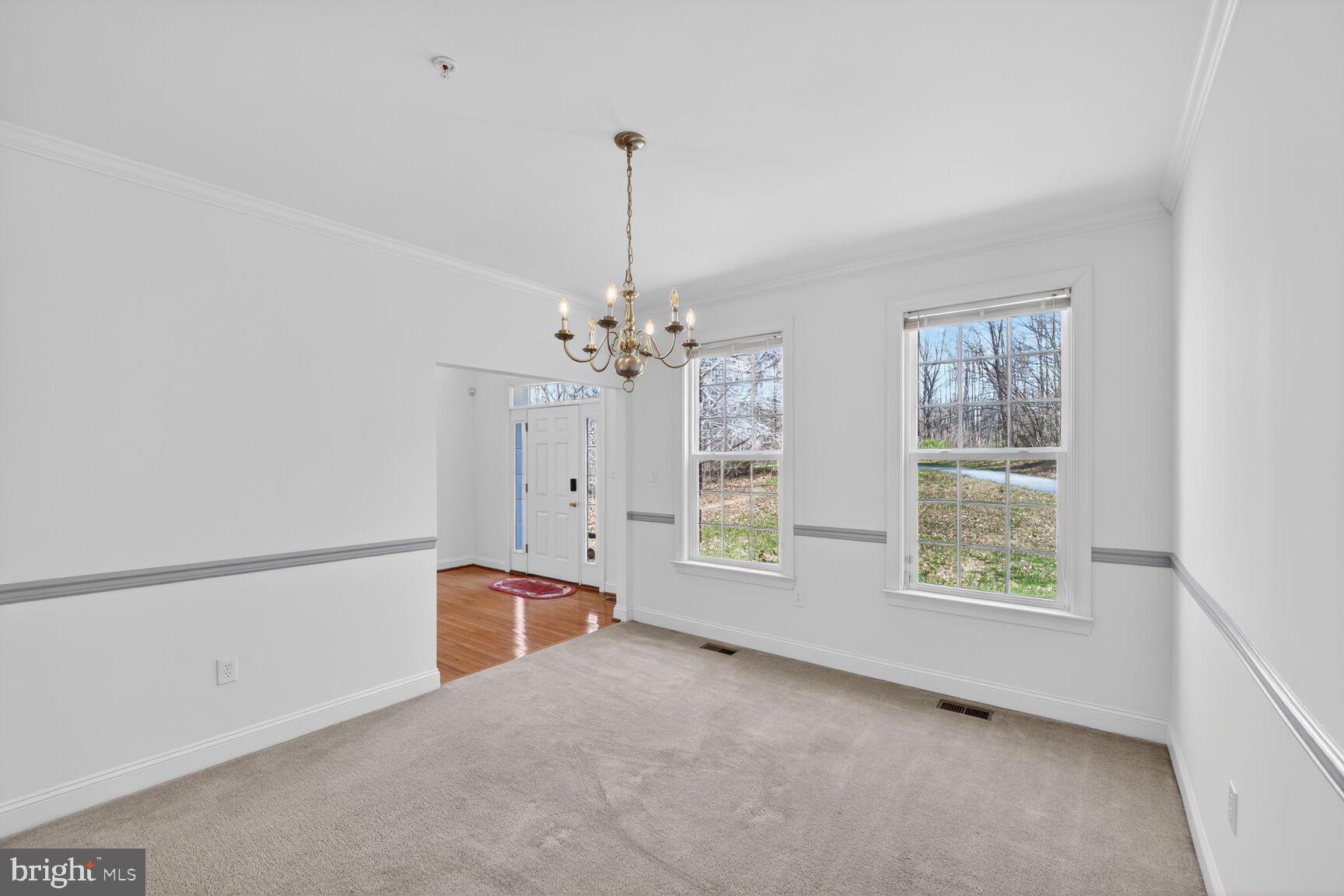 15900 Tanyard Road Upper Marlboro, MD 20772 - Photo 19 of 34 a view of an empty room with a window