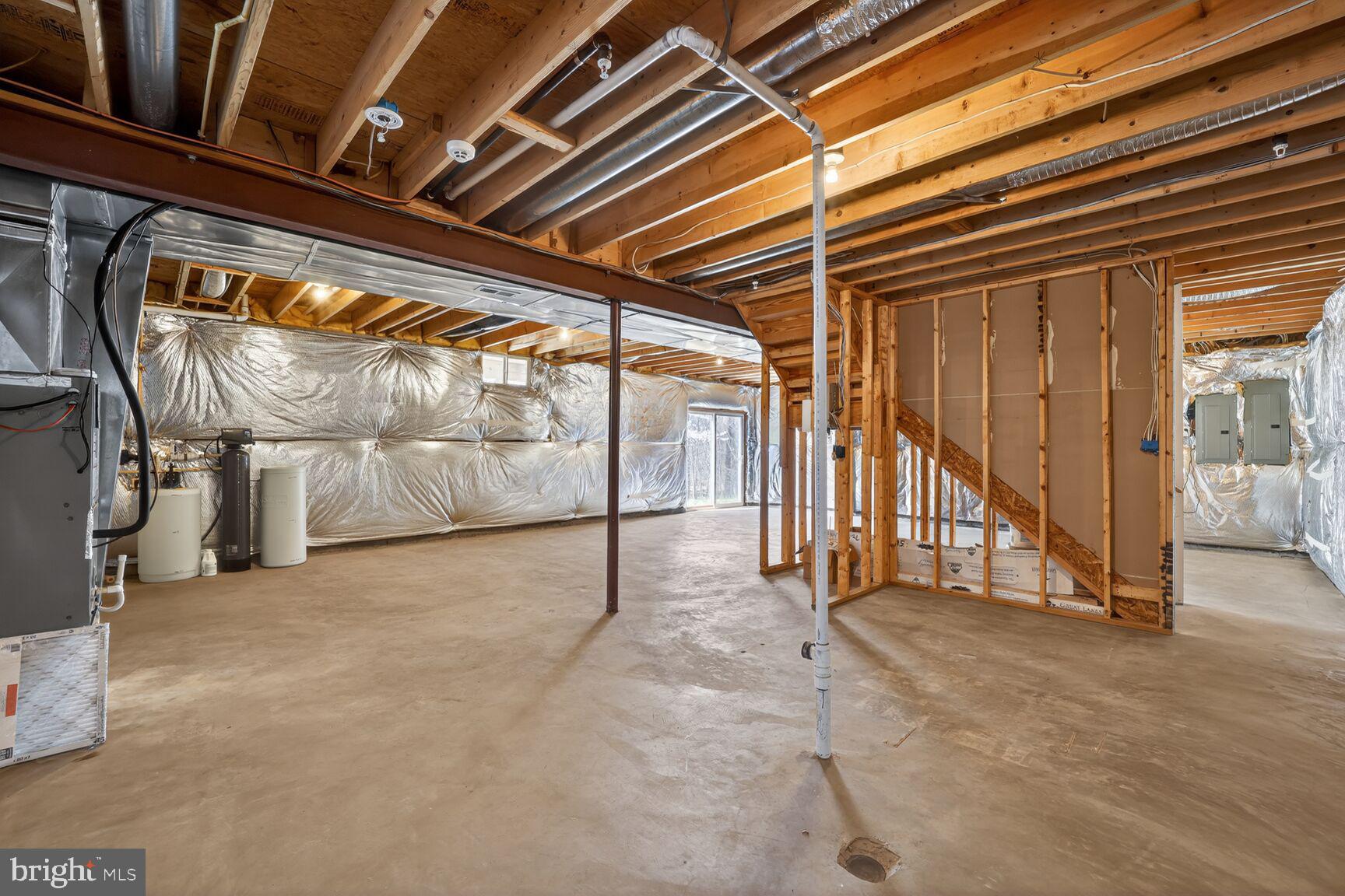 15900 Tanyard Road Upper Marlboro, MD 20772 - Photo 30 of 34 a view of an empty room with wooden floor