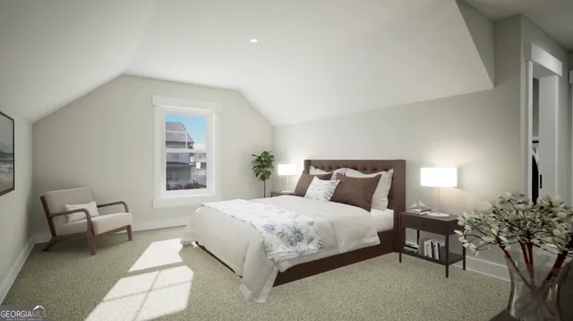 a bedroom with a bed and a couch