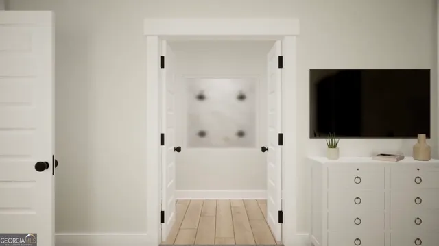 a bathroom with a sink and mirror