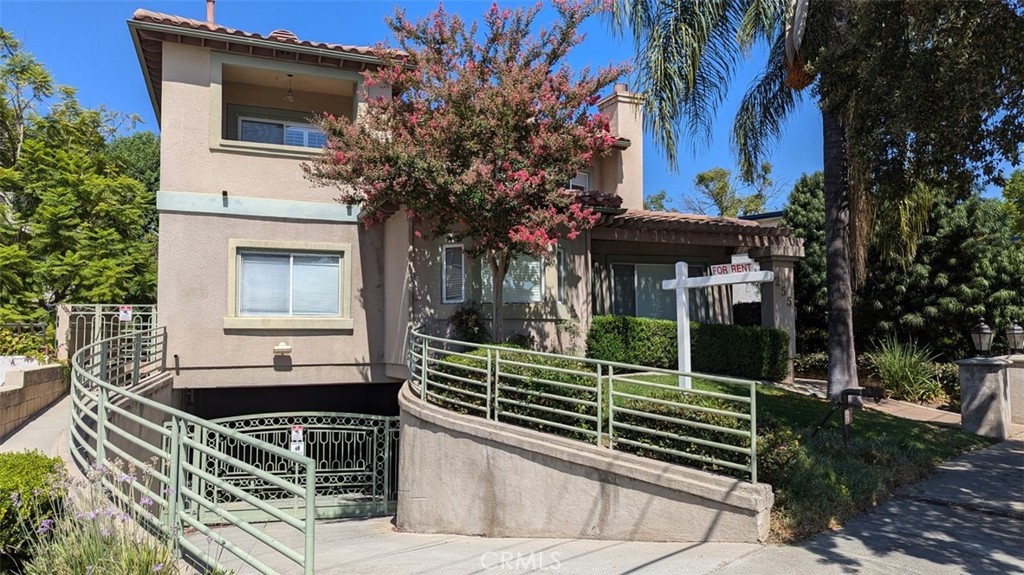 255 North Michigan Avenue, Unit 4 Pasadena, CA 91106 - Photo 1 of 1 a front view of a house with garden