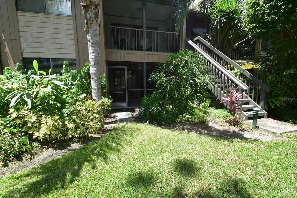 1709 Pelican Cove Road, Unit GL349 Sarasota, FL 34231 - Photo 11 of 29 a view of balcony with flower plants