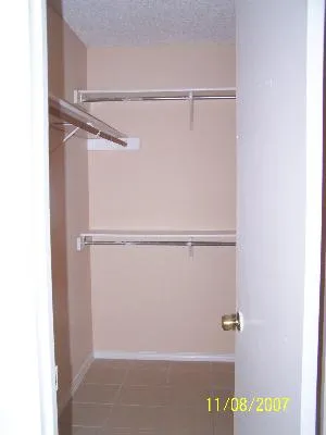 a view of small space with racks on the wall