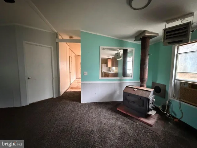 a room with furniture and a window