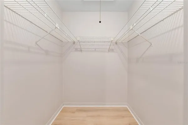 a view of a room with racks on the wall