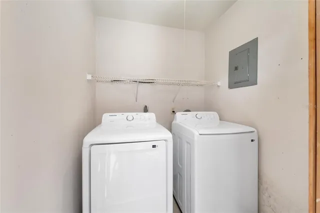 a utility room with dryer and washer