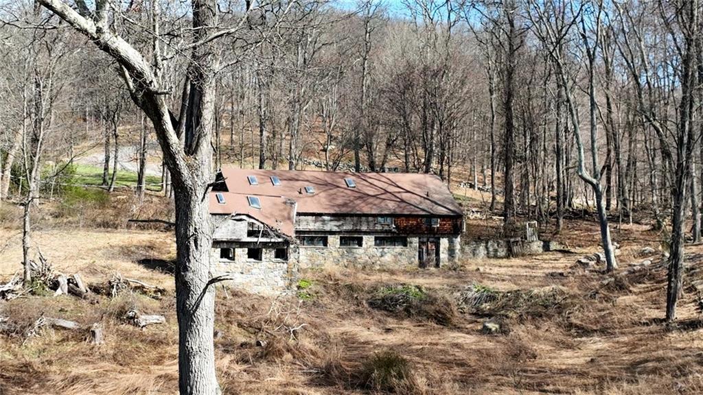 292 Croton Falls Road Carmel, NY 10541 - Photo 10 of 10 a backyard of a house with barbeque oven table and chairs
