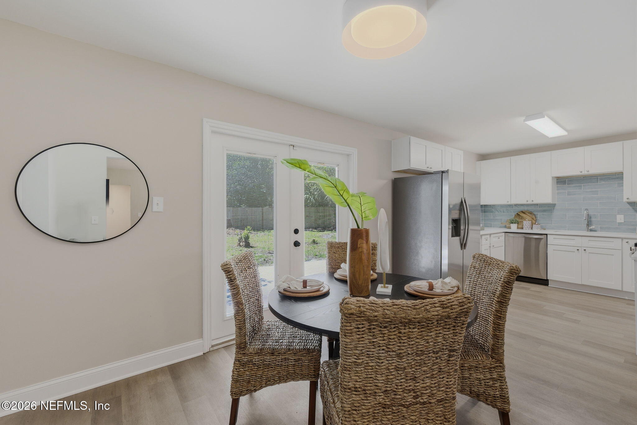 10184 Herndon Road Jacksonville, FL 32246 - Photo 11 of 28 a dining room with furniture and window