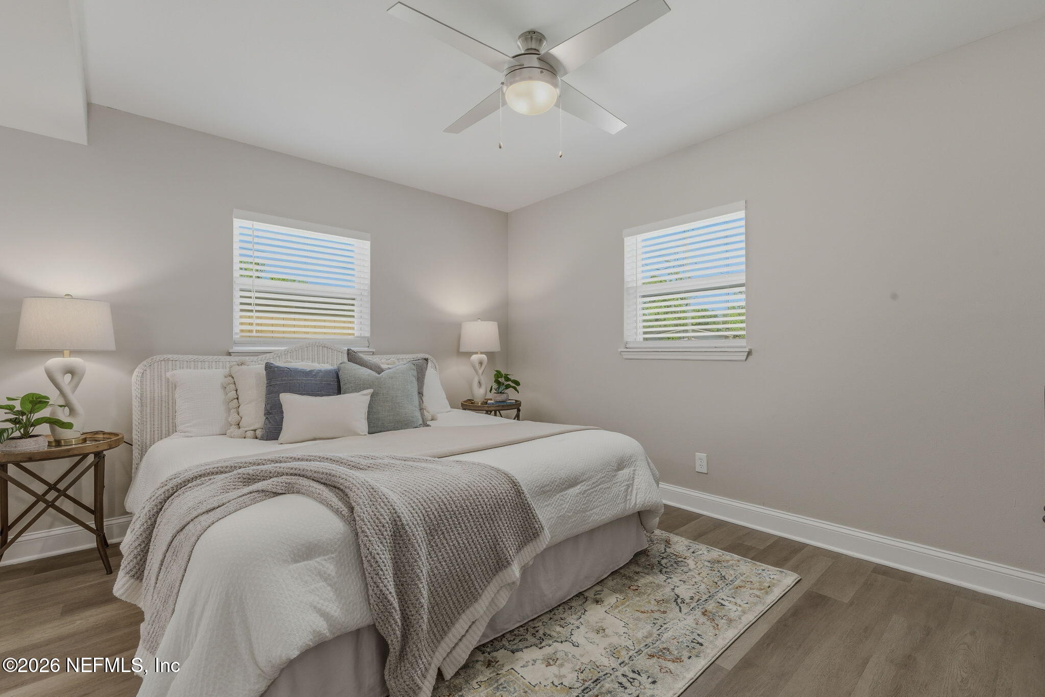 10184 Herndon Road Jacksonville, FL 32246 - Photo 19 of 28 a bedroom with a bed and a window