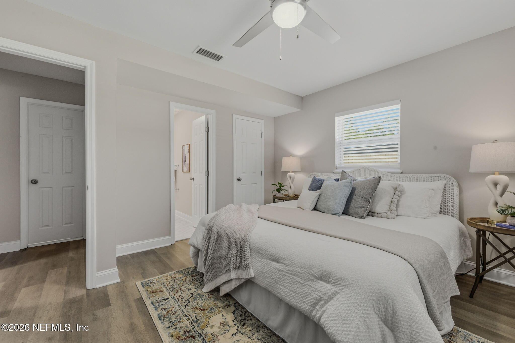 10184 Herndon Road Jacksonville, FL 32246 - Photo 20 of 28 a bedroom with a bed and a window